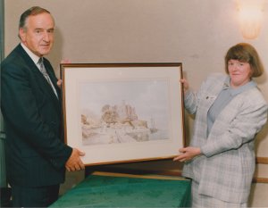 Taoiseach Albert Reynolds presented with a watercolour by hamilton sloan of King Johns castle Carlingford by the carlingford heritage centre county louth